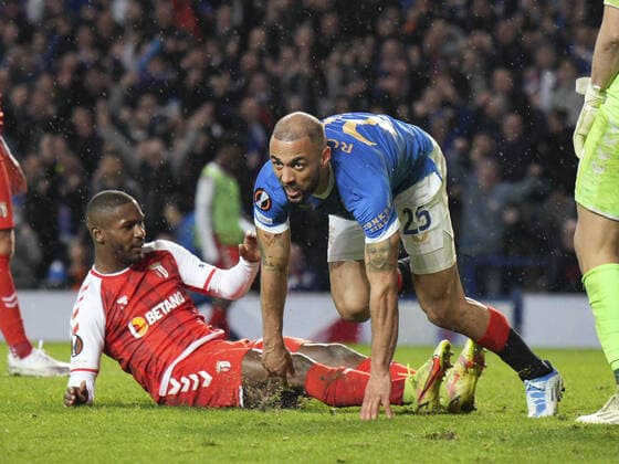 Mandatory Credit: Photo by Stuart Wallace Shutterstock (12893325cm) Kemar Roofe of Rangers leaves Andre Horta of SC Braga behind him & SC Braga goalkeeper Matheus, right, after scoring in extra time to give Rangers a 3-1 lead (agg. 3-2). Rangers v Braga, UEFA Europa League, Quarter Final, Second Leg, Football, Ibrox Stadium, Glasgow, UK - 14 Apr 2022 EDITORIAL USE ONLY No use with unauthorised audio, video, data, fixture lists, club league logos or live services. Online in-match use limited to 120 images, no video emulation. No use in betting, games or single club league player publications. Rangers v Braga, UEFA Europa League, Quarter Final, Second Leg, Football, Ibrox Stadium, Glasgow, UK - 14 Apr 2022 EDITORIAL USE ONLY No use with unauthorised audio, video, data, fixture lists, club league logos or live services. Online in-match use limited to 120 images, no video emulation. No use in betting, games or single club league player publications.  Copyright: xStuartxWallace Shutterstockx 12893325cm