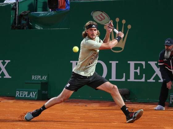 (220416) -- ROQUEBRUNE CAP MARTIN, April 16, 2022 -- Greece s Stefanos Tsitsipas returns the ball during the men s singles quarter-final match against Argentina s Diego Schwartzman at the Monte-Carlo Masters tennis tournament in Roquebrune Cap Martin, France, April 15, 2022. (Photo by Xinhua) (SP)FRANCE-ROQUEBRUNE CAP MARTIN-TENNIS-MONTE-CARLO MASTERS SergexHaouzi 