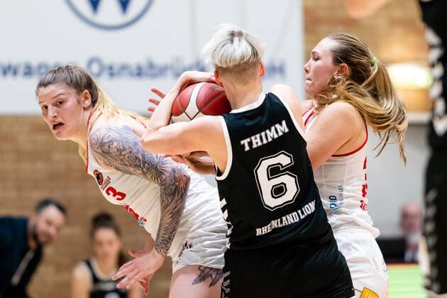 Basketball DBBL Play GiroLive Panthers Osnabrück Rheinland Lions on 16 04 2022 at the home of panthers in Osnabrück Birte Thimm Rheinland Lions is fouled by Samantha Führing Fuehring Panthers Osnabrueck and Jill Townsend Panthers Osnabrueck PD