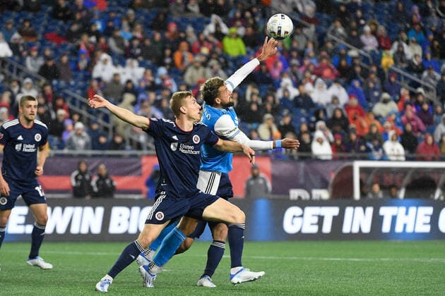 April 16, 2022: New England Revolution forward Adam Buksa (9) and Charlotte FC defender GuzmoÂ¡n Corujo (4) battle for the ball during the MLS, Fussball Herren, USA game between Charlotte FC and the New England Revolution held at Gillette Stadium in Foxborough Massachusetts. CSM Foxborough USA - ZUMAc04_ 20220416_zaf_c04_060 Copyright: xEricxCanhax