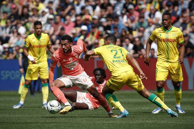 Angelo Fulgini (Angers SCO) vs Jean-Charles Castelletto (Nantes) FOOTBALL : FC Nantes vs Angers SCO - Ligue 1 Uberteat - 17 04 2022 AurelienMorissard Panoramic 