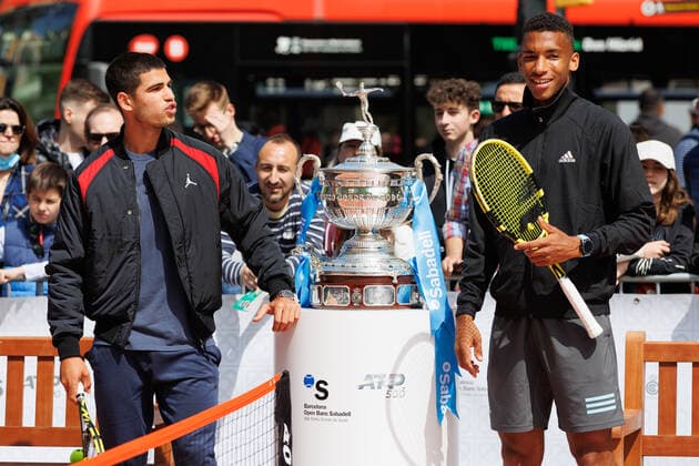 April 18, 2022, Barcelona, Barcelona, Spain: Felix Auger Aliassime and Carlos Alcaraz during the photo oportunity exhibition between Carlos Alcaraz and Felix Auger Aliassime at Passeig de Gracia in Barcelona, Spain. Barcelona Spain - ZUMAd159 20220418_zia_d159_020 Copyright: xDavidxRamirezx