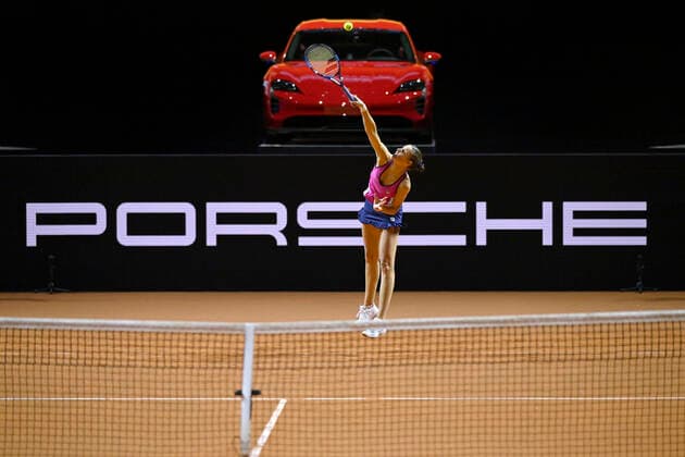 Karolina Pliskova CZE action serve in front of winning car Porsche Taycan GTS advertising Porsche logo tennis ladies Porsche Cup Porsche Tennis Grand Prix GP Stuttgart 2022 Porsche Arena 20 04 2022 DFL REGULATES PROHIBIT ANY USE OF PHOTOGRAPHS AS IMAGE SEQUENCES AND OR QUASI VIDEO Porsche Tennis Grand Prix GP Stuttgart 2022