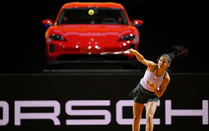 Elena Raducanu GBR serve action in front of winning car Porsche Taycan GTS Tennis Women Porsche Cup Porsche Tennis Grand Prix GP Stuttgart 2022 Porsche Arena 20 04 2022 DFL REGULATES PROHIBIT ANY USE OF PHOTOGRAPHS AS IMAGE SEQUENCES AND OR QUASI VIDEO Porsche Tennis Grand Prix GP Stuttgart 2022