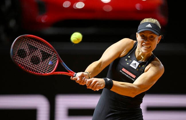 Angelique Kerber GER action in front of winning car Porsche Taycan GTS Tennis Women Porsche Cup Porsche Tennis Grand Prix GP Stuttgart 2022 Porsche Arena 20 04 2022 DFL REGULATIONS PROHIBIT ANY USE OF PHOTOGRAPHS AS IMAGE SEQUENCES AND OR QUASI VIDEO Porsche Tennis Grand Prix GP Stuttgart 2022