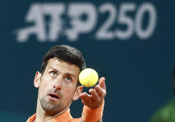 (220421) -- BELGRADE, April 21, 2022 -- Serbia s Novak Djokovic serves the ball during a men s singles match against Serbia s Laslo Djere at Serbia Tennis Open ATP, Tennis Herren 250 series tournament in Belgrade, Serbia on April 20, 2022. (Photo by Xinhua) (SP)SERBIA-BELGRADE-TENNIS-SERBIA OPEN-MEN S SINGLES PredragxMilosavljevic 