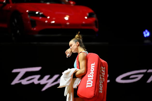 Maria Sakkari GRE must give up injured due to injury disappointed tears cries goodbye to Stuttgart crowd in front of winning car Porsche Taycan GTS Tennis Ladies Porsche Cup Porsche Tennis Grand Prix GP Stuttgart 2022 Porsche Arena 21 04 2022 DFL REGULATES PROHIBIT ANY USE OF PHOTOGRAPHS AS IMAGE SEQUENCES AND OR QUASI VIDEO Porsche Tennis Grand Prix GP Stuttgart 2022