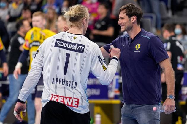 f l Mikael Alf Appelgren goalkeeper, RNL, 1 , Uwe Gensheimer RNL, 3 , player of Rhein Neckar Löwen, cheering after the final whistle, victory, winner, cheers, joy, optimistic, highlight, action, 21 04 2022, Mannheim Germany , Handball, Bundesliga, Rhein Neckar Löwen TVB Stuttgart xozx