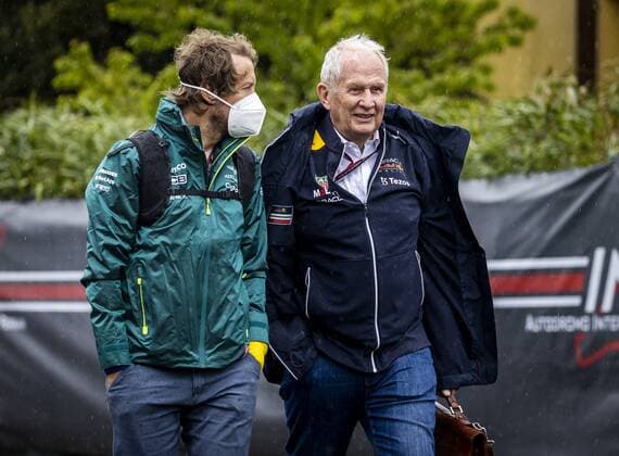 IMOLA Sebastian Vettel Aston Martin talks to Helmut Marko Red Bull Racing on arrival at the track ahead of the 1st free practice session of the Emilia Romagna F1 Grand Prix at Autodromo Enzo e Dino Ferrari REMKO DE WAAL GP Emilia Romagna 2022 Practice 1 2022 xVIxANPxSportx xxANPxIVx 447434249 originalFilename: 447434249.jpg