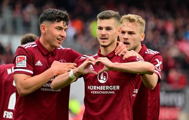 Sport Themen der Woche KW16 Sport Bilder des Tages 24.04.2022 - Fussball - Saison 2021 2022 - 2. Fussball - Bundesliga - 31. Spieltag: 1. FC Nürnberg FCN ( Club ) - SV Sandhausen 1916 SVS - Sportfoto Zink - DFL regulations prohibit any use of photographs as image sequences and or quasi-video - only for editorial use - Torjubel Jubel Freude nach Treffer Tor Torschuß zum 1:1 durch Tom Krauß Krauss (14, 1. FC Nürnberg FCN ) - Taylan Duman (8, 1. FC Nürnberg FCN ) Tom Krauß Krauss (14, 1. FC Nürnberg FCN ) Tim Handwerker (29, 1. FC Nürnberg FCN ) *** 24 04 2022 Football Season 2021 2022 2 Football Bundesliga 31 Matchday 1 FC Nürnberg FCN Club SV Sandhausen 1916 SVS Sportfoto Zink DFL regulations prohibit any use of photographs as image sequences and or quasi video only for editorial use Torjubel Jubel Freude nach Treffer Torschuss zum 1 1 by Tom Krauß Krauss 14, 1 FC Nürnberg FCN Taylan Duman 8, 1 FC Nürnberg FCN Tom Krauß Krauss 14, 1 FC Nürnberg FCN Tim Handwerker 29, 1 FC Nürnberg FCN