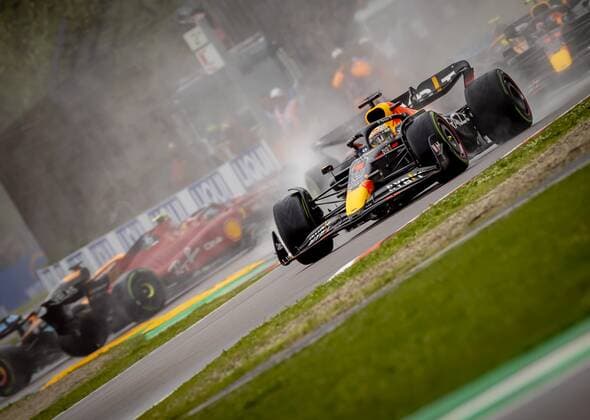 IMOLA Max Verstappen 1 with the Oracle Red Bull Racing RB18 Honda on the track, with Carlos Sainz 55 in the background with the Ferrari sliding off the track during the F1 Grand Prix of Emilia Romagna at Autodromo Enzo e Dino Ferrari on April 24, 2022 in Imola, Italy REMKO DE WAAL GP Emilia Romagna 2022 RACE 2022 xVIxANPxSportx xxANPxIVx 447557882 originalFilename: 447557882.jpg