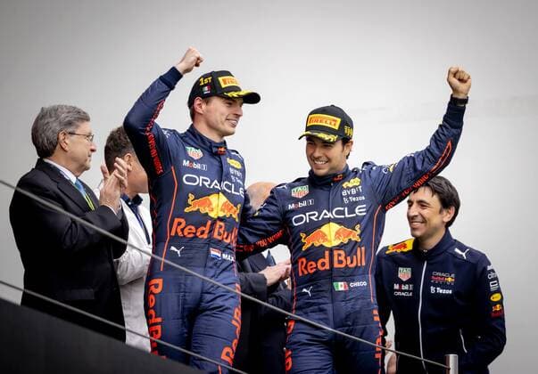 IMOLA Max Verstappen 1 and Sergio Perez 11 of Oracle Red Bull Racing on the podium after winning the Emilia Romagna F1 Grand Prix at Autodromo Enzo e Dino Ferrari on April 24, 2022 in Imola, Italy REMKO DE WAAL GP Emilia Romagna 2022 RACE 2022 xVIxANPxSportx xxANPxIVx 447559336 originalFilename: 447559336.jpg