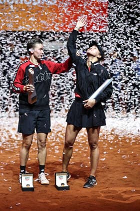 Demi Schuurs, NED cap , and Desirae Krawczyk, USA, after doubles finals at 2022 Porsche Tennis Grand Prix in Stuttgart, 24 04 2022