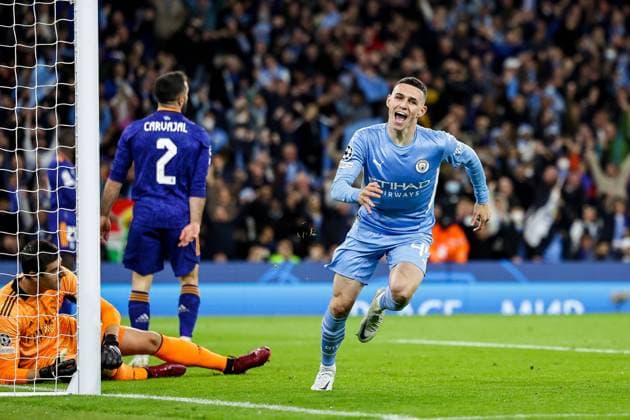 Sport Bilder des Tages Manchester City v Real Madrid Champions League 26 04 2022. Goal 3-1 Phil Foden (47) of Manchester City scores a goal and celebrates during the Champions League match between Manchester City and Real Madrid at the Etihad Stadium, Manchester, England on 26 April 2022. Editorial use only , Copyright: xNigelxKeenex PSI-15165-0024