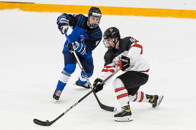 IIHF Ice Hockey U18 World Championship 2022, Finland FIN vs Canada CAN 28 04 2022, Erdgas Schwaben Arena, Kaufbeuren, IIHF Ice Hockey U18 World Championship 2022, Finland FIN vs Canada CAN , in picture Elmeri Laakso FIN, 4 , Michael Mastrodomenico CAN, 4 nordphotoxGmbHx xHafner nph00200