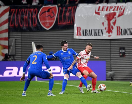 Football, men, 2021 2022 season, Europa League semifinals, first leg , RB Leipzig Glasgow Rangers, v l James Tavernier Glasgow Rangers , Scott Wrigh Glasgow Rangers , Angelino RB Leipzig , 28 04 2022, Copyright: xSebastianxRäppold MatthiasxKochx