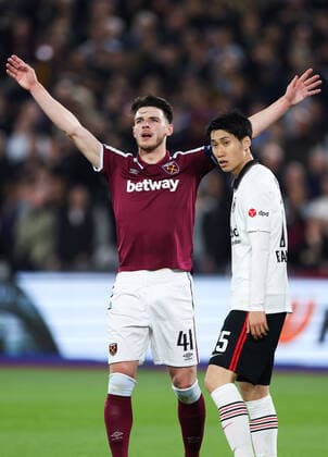 Mandatory Credit: Photo by Simon Dael Shutterstock (12914205bv) Declan Rice of West Ham United and Daichi Kamada of Eintracht Frankfurt West Ham United v Eintracht Frankfurt, UEFA Europa League, Semi-Final, First Leg, Football, The London Stadium, London, UK - 28 Apr 2022 EDITORIAL USE ONLY No use with unauthorised audio, video, data, fixture lists, club league logos or live services. Online in-match use limited to 120 images, no video emulation. No use in betting, games or single club league player publications. West Ham United v Eintracht Frankfurt, UEFA Europa League, Semi-Final, First Leg, Football, The London Stadium, London, UK - 28 Apr 2022 EDITORIAL USE ONLY No use with unauthorised audio, video, data, fixture lists, club league logos or live services. Online in-match use limited to 120 images, no video emulation. No use in betting, games or single club league player publications. Copyright: xSimonxDael Shutterstockx 12914205bv