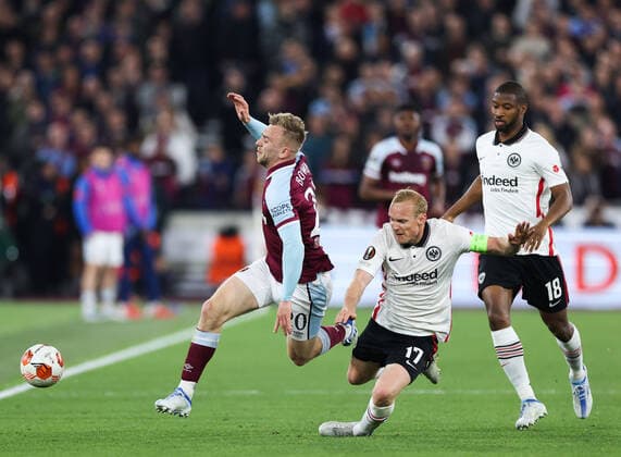 Mandatory Credit: Photo by Simon Dael Shutterstock (12914205br) Jarrod Bowen of West Ham United is felled by Sebastian Rode of Eintracht Frankfurt West Ham United v Eintracht Frankfurt, UEFA Europa League, Semi-Final, First Leg, Football, The London Stadium, London, UK - 28 Apr 2022 EDITORIAL USE ONLY No use with unauthorised audio, video, data, fixture lists, club league logos or live services. Online in-match use limited to 120 images, no video emulation. No use in betting, games or single club league player publications. West Ham United v Eintracht Frankfurt, UEFA Europa League, Semi-Final, First Leg, Football, The London Stadium, London, UK - 28 Apr 2022 EDITORIAL USE ONLY No use with unauthorised audio, video, data, fixture lists, club league logos or live services. Online in-match use limited to 120 images, no video emulation. No use in betting, games or single club league player publications. Copyright: xSimonxDael Shutterstockx 12914205br
