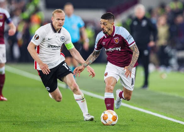 Mandatory Credit: Photo by Andrew Fosker Shutterstock (12914204bj) Sebastian Rode of Eintracht Frankfurt and Manuel Lanzini of West Ham United West Ham United v Eintracht Frankfurt, UEFA Europa League, Semi-Final, First Leg, Football, The London Stadium, London, UK - 28 Apr 2022 EDITORIAL USE ONLY No use with unauthorised audio, video, data, fixture lists, club league logos or live services. Online in-match use limited to 120 images, no video emulation. No use in betting, games or single club league player publications. West Ham United v Eintracht Frankfurt, UEFA Europa League, Semi-Final, First Leg, Football, The London Stadium, London, UK - 28 Apr 2022 EDITORIAL USE ONLY No use with unauthorised audio, video, data, fixture lists, club league logos or live services. Online in-match use limited to 120 images, no video emulation. No use in betting, games or single club league player publications.  Copyright: xAndrewxFosker Shutterstockx 12914204bj