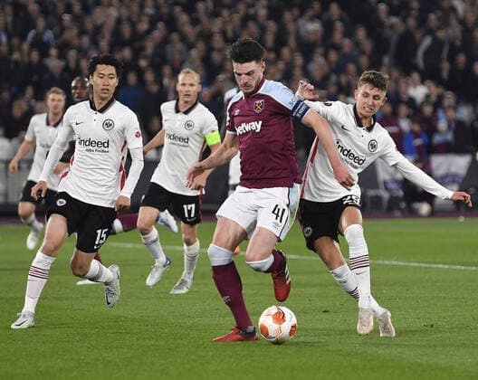 Mandatory Credit: Photo by James Griffiths West Ham United Shutterstock (12914199at) Declan Rice of West Ham United in action with Jesper Lindstrom of Eintracht Frankfurt West Ham United v Eintracht Frankfurt, UEFA Europa League, Semi-Final, First Leg, Football, The London Stadium, London, UK - 28 Apr 2022 EDITORIAL USE ONLY No use with unauthorised audio, video, data, fixture lists, club league logos or live services. Online in-match use limited to 120 images, no video emulation. No use in betting, games or single club league player publications. West Ham United v Eintracht Frankfurt, UEFA Europa League, Semi-Final, First Leg, Football, The London Stadium, London, UK - 28 Apr 2022 EDITORIAL USE ONLY No use with unauthorised audio, video, data, fixture lists, club league logos or live services. Online in-match use limited to 120 images, no video emulation. No use in betting, games or single club league player publications.  Copyright: xJamesxGriffiths WestxHamxUnited Shutterstockx 12914199at