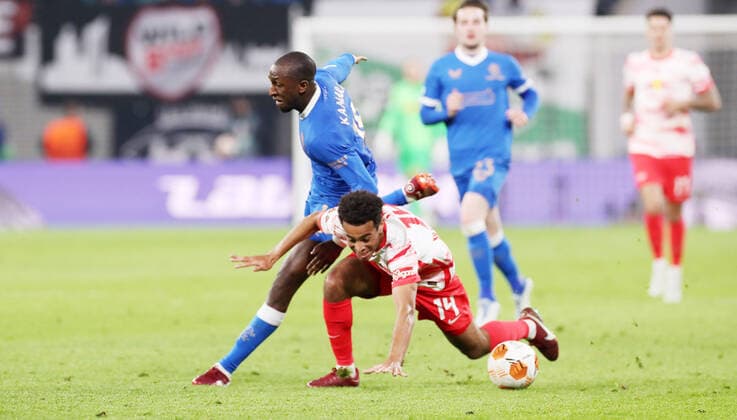 RB Leipzig Glasgow Rangers 28 04 2022 Leipzig, 28 04 2022, Red Bull Arena, Football, UEFA Europa League, Semi final first leg, RB Leipzig vs Rangers FC Glasgow , Pictured from front Christopher Nkunku 18, RB Leipzig , Glen Kamara 18, Rangers , UEFA regulations prohibit any use of photographs as image sequences and or quasi video
