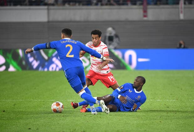 Football, men, 2021 2022 season, Europa League semifinals, first leg , RB Leipzig Glasgow Rangers, v l James Tavernier Glasgow Rangers , Tyler Adams RB Leipzig , Glen Kamar Glasgow Rangers , 28 04 2022, Copyright: xSebastianxRäppold MatthiasxKochx