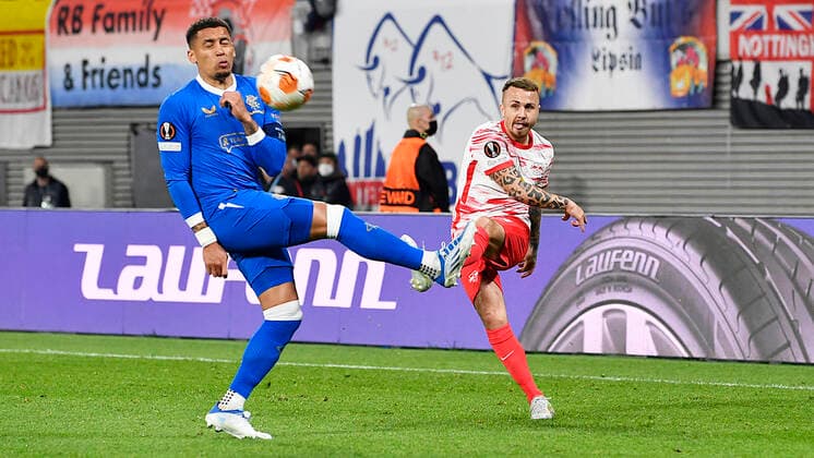 Soccer UEFA Europa League, semi-final, first leg season 2021 2022, RB Leipzig vs Glasgow Rangers 28 04 2022 cross Angelino Left defender RB Leipzig, back number 3, 3 re against James Tavernier Right defender Glasgow Rangers, back number 2 li during the match RB Leipzig vs Glasgow Rangers 28 04 2022 Leipzig Saxony Germany Red Bull Arena