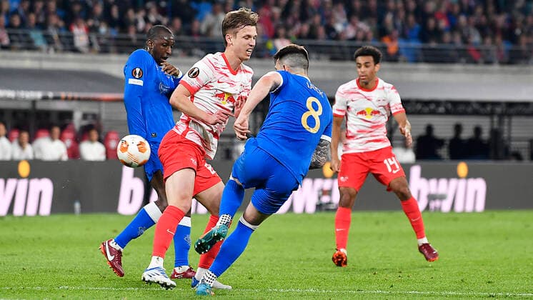 Soccer UEFA Europa League, semifinal, first leg season 2021 2022, RB Leipzig vs Glasgow Rangers 28 04 2022 Duel for the ball between Dani Olmo Offensive midfield RB Leipzig, back number 25, 25 center and Ryan Jack Central midfield Glasgow Rangers, back number 8 re during the match RB Leipzig vs Glasgow Rangers 28 04 2022 Leipzig Saxony Germany Red Bull Arena