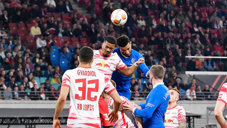Soccer UEFA Europa League, semifinal, first leg season 2021 2022, RB Leipzig vs Glasgow Rangers 28 04 2022 header duel with Benjamin Henrichs right defender RB Leipzig, back number 39, 39 left and Connor Goldson center back Glasgow Rangers, back number 6 right during the match RB Leipzig vs Glasgow Rangers 28 04 2022 Leipzig Saxony Germany Red Bull Arena