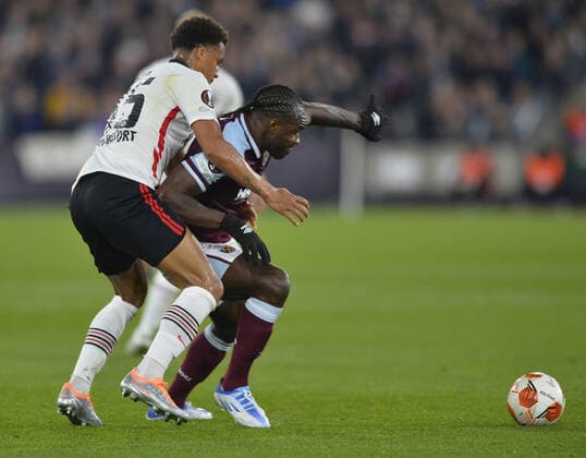 Mandatory Credit: Photo by James Griffiths West Ham United Shutterstock (12914199ax) Michail Antonio of West Ham United in action with Tuta of Eintracht Frankfurt West Ham United v Eintracht Frankfurt, UEFA Europa League, Semi-Final, First Leg, Football, The London Stadium, London, UK - 28 Apr 2022 EDITORIAL USE ONLY No use with unauthorised audio, video, data, fixture lists, club league logos or live services. Online in-match use limited to 120 images, no video emulation. No use in betting, games or single club league player publications. West Ham United v Eintracht Frankfurt, UEFA Europa League, Semi-Final, First Leg, Football, The London Stadium, London, UK - 28 Apr 2022 EDITORIAL USE ONLY No use with unauthorised audio, video, data, fixture lists, club league logos or live services. Online in-match use limited to 120 images, no video emulation. No use in betting, games or single club league player publications.  Copyright: xJamesxGriffiths WestxHamxUnited Shutterstockx 12914199ax