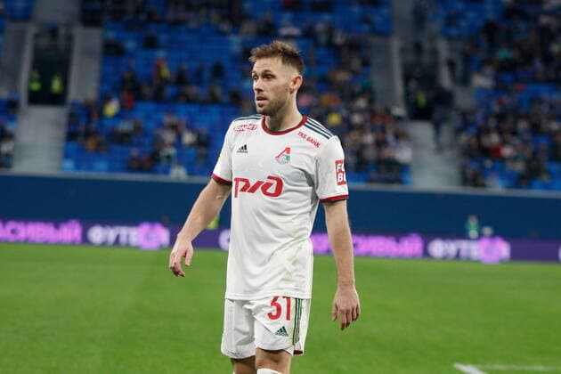 Saint Petersburg, Russia 30 April 2022: Football. Russian Premier League 2021-2022. Zenit FC FC Lokomotiv. Player Maciej Rybus; MaksimxKonstantinov