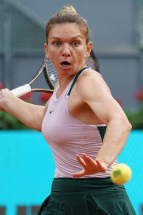 April 30, 2022, Madrid, Spain: Simona Halep of Romania plays against Paula Badosa of Spain in her second round match on Day 3 of the Mutua Madrid Open at La Caja Magica in Madrid..Simona Halep beats Paula Badosa (6.6) Madrid Spain - ZUMAs197 20220430_zaa_s197_122 Copyright: xAtilanoxGarciax