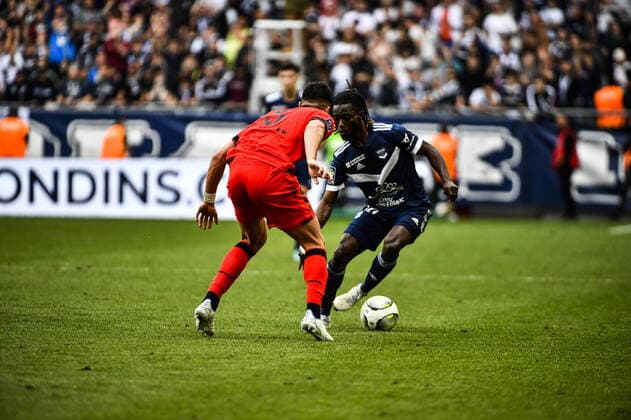 Gideon Mensah (gir) vs Flavius Daniliuc (ogc) FOOTBALL : Bordeaux vs Nice - 35eme Journee de L1 Ubereats - Bordeaux - 01 05 2022 ThierryBreton Panoramic 