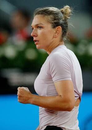 Mandatory Credit: Photo by Ella Ling Shutterstock (12915014bf) Simona Halep of Romania celebrates Mutua Madrid Open, Tennis, La Caja Magica, Madrid, Spain - 02 May 2022 Mutua Madrid Open, Tennis, La Caja Magica, Madrid, Spain - 02 May 2022  Copyright: xEllaxLing Shutterstockx 12915014bf