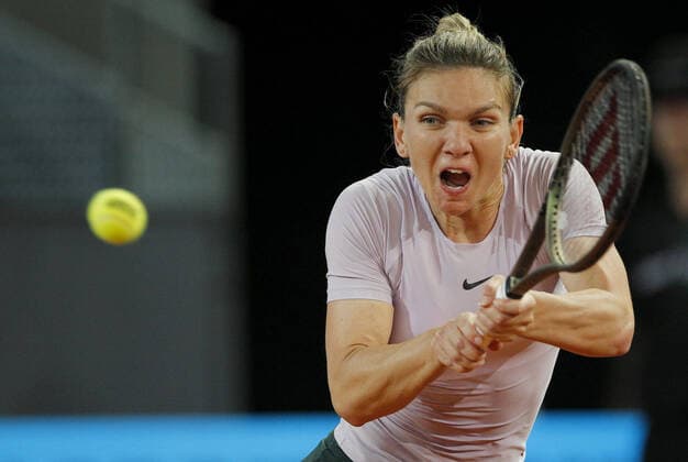 Mandatory Credit: Photo by Ella Ling Shutterstock (12915014bj) Simona Halep of Romania in action Mutua Madrid Open, Tennis, La Caja Magica, Madrid, Spain - 02 May 2022 Mutua Madrid Open, Tennis, La Caja Magica, Madrid, Spain - 02 May 2022  Copyright: xEllaxLing Shutterstockx 12915014bj