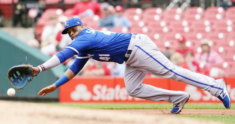 Kansas City Royals first baseman Carlos Santana dives for the baseball off the bat of St. Louis Cardinals Corey Dickerson in the fourth inning at Busch Stadium in St. Louis on Monday, May 2, 2022.  SLP2022050206 BILLxGREENBLATT