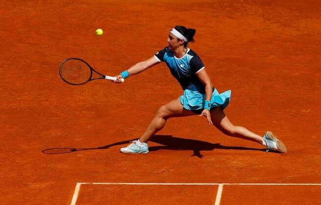 Mandatory Credit: Photo by Ella Ling Shutterstock (12922067e) Ons Jabeur of Tunisia in action Mutua Madrid Open, Tennis, La Caja Magica, Madrid, Spain - 04 May 2022 Mutua Madrid Open, Tennis, La Caja Magica, Madrid, Spain - 04 May 2022  Copyright: xEllaxLing Shutterstockx 12922067e