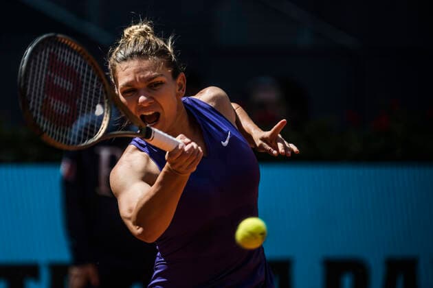 May 4, 2022, Madrid, Madrid, Spain: SIMONA HALEP (ROU) returns the ball to Ons Jabeur (TUN) at Day 7 of the Madrid Open 2022. Jabeur wins 6:3, 6:2 Madrid Spain - ZUMAo105 20220504_zap_o105_013 Copyright: xMatthiasxOesterlex