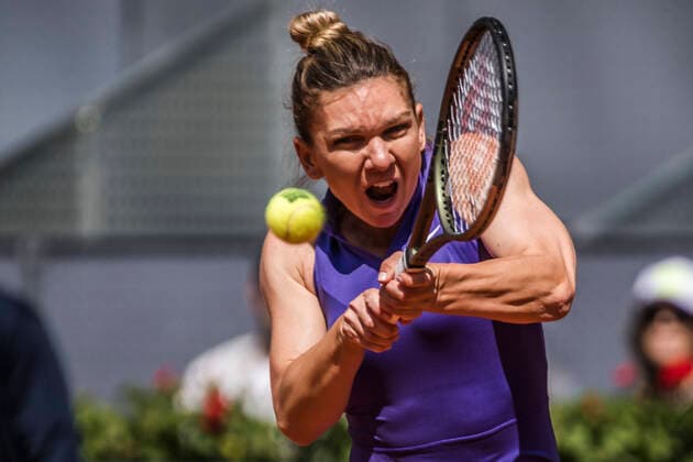 May 4, 2022, Madrid, Madrid, Spain: SIMONA HALEP (ROU) returns the ball to Ons Jabeur (TUN) at Day 7 of the Madrid Open 2022. Jabeur wins 6:3, 6:2 Madrid Spain - ZUMAo105 20220504_zap_o105_014 Copyright: xMatthiasxOesterlex