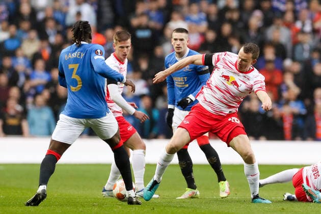 Glasgow Rangers RB Leipzig 05 05 2022 Glasgow, 05 05 2022, Ibrox Stadium, Football, 2021 2022 season, Europa League, Semifinals, Glasgow Rangers RB Leipzig , Pictured f l Calvin Bassey 3, Rangers , Dani Olmo 25, RB Leipzig , Ryan Kent 14, Rangers and Lukas Klostermann 16, RB Leipzig UEFA regulations prohibit any use of photographs as image sequences and or quasi video