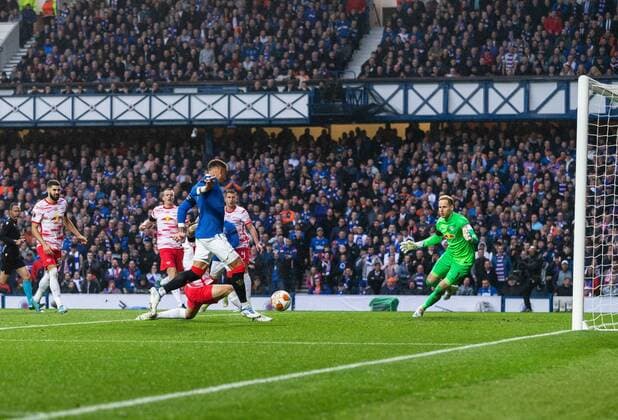 Mandatory Credit: Photo by Luke Nickerson Rangers FC Shutterstock (12926015o) Rangers Defender James Tavernier scores his sides first goal Rangers v RB Leipzig, UEFA Europa League, Semi Final, Second Leg, Football, Ibrox Stadium, Glasgow, UK - 05 May 2022 EDITORIAL USE ONLY No use with unauthorised audio, video, data, fixture lists, club league logos or live services. Online in-match use limited to 120 images, no video emulation. No use in betting, games or single club league player publications. Rangers v RB Leipzig, UEFA Europa League, Semi Final, Second Leg, Football, Ibrox Stadium, Glasgow, UK - 05 May 2022 EDITORIAL USE ONLY No use with unauthorised audio, video, data, fixture lists, club league logos or live services. Online in-match use limited to 120 images, no video emulation. No use in betting, games or single club league player publications.  Copyright: xLukexNickerson RangersxFC Shutterstockx 12926015o