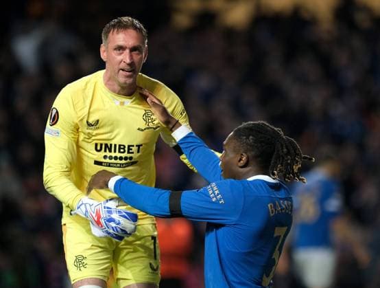 Ibrox Stadium, Glasgow, Scotland, May 5th 2022: Rangers goalkeeper Allan McGregor celebrates with Calvin Bassey (Rangers) at the final whistle after the UEFA Europa League semi final 2nd leg match between Glasgow Rangers and RB Leipzig at Ibrox Stadium in Glasgow, Scotland. UEFA Europa League semi final 2nd leg Alex Todd SPP Glasgow Rangers v RB Leipzig 