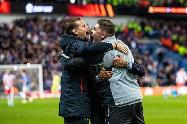 Mandatory Credit: Photo by Kirk O Rourke Rangers FC Shutterstock (12926021ap) Rangers manager Giovanni van Bronckhorst celebrates at the full time whistle with assistant manager Dave Vos and goalkeeping coach Colin Stewart during the Europa League Semi Final match against RB Leipzig at Ibrox Stadium, Glasgow. Rangers v RB Leipzig, UEFA Europa League, Semi Final, Second Leg, Football, Ibrox Stadium, Glasgow, UK - 05 May 2022 EDITORIAL USE ONLY No use with unauthorised audio, video, data, fixture lists, club league logos or live services. Online in-match use limited to 120 images, no video emulation. No use in betting, games or single club league player publications. Rangers v RB Leipzig, UEFA Europa League, Semi Final, Second Leg, Football, Ibrox Stadium, Glasgow, UK - 05 May 2022 EDITORIAL USE ONLY No use with unauthorised audio, video, data, fixture lists, club league logos or live services. Online in-match use limited to 120 images, no video emulation. No use in betting, games or single club league player publications. Copyright: xKirkxO Rourke RangersxFC Shutterstockx 12926021ap