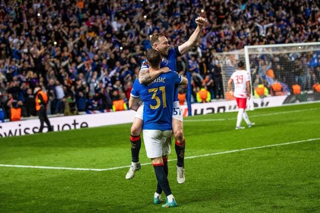 Mandatory Credit: Photo by Kirk O Rourke Rangers FC Shutterstock (12926021bd) Scott Arfield and Borna Barisic celebrate at the end of the Europa League Semi Final match against RB Leipzig at Ibrox Stadium, Glasgow. Rangers v RB Leipzig, UEFA Europa League, Semi Final, Second Leg, Football, Ibrox Stadium, Glasgow, UK - 05 May 2022 EDITORIAL USE ONLY No use with unauthorised audio, video, data, fixture lists, club league logos or live services. Online in-match use limited to 120 images, no video emulation. No use in betting, games or single club league player publications. Rangers v RB Leipzig, UEFA Europa League, Semi Final, Second Leg, Football, Ibrox Stadium, Glasgow, UK - 05 May 2022 EDITORIAL USE ONLY No use with unauthorised audio, video, data, fixture lists, club league logos or live services. Online in-match use limited to 120 images, no video emulation. No use in betting, games or single club league player publications. Copyright: xKirkxO Rourke RangersxFC Shutterstockx 12926021bd