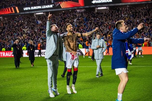 Mandatory Credit: Photo by Kirk O Rourke Rangers FC Shutterstock (12926021cy) Andy Firth., Connor Goldson and Ryan Jack celebrate at the end of the Europa League Semi Final match against RB Leipzig at Ibrox Stadium, Glasgow. Rangers v RB Leipzig, UEFA Europa League, Semi Final, Second Leg, Football, Ibrox Stadium, Glasgow, UK - 05 May 2022 EDITORIAL USE ONLY No use with unauthorised audio, video, data, fixture lists, club league logos or live services. Online in-match use limited to 120 images, no video emulation. No use in betting, games or single club league player publications. Rangers v RB Leipzig, UEFA Europa League, Semi Final, Second Leg, Football, Ibrox Stadium, Glasgow, UK - 05 May 2022 EDITORIAL USE ONLY No use with unauthorised audio, video, data, fixture lists, club league logos or live services. Online in-match use limited to 120 images, no video emulation. No use in betting, games or single club league player publications. Copyright: xKirkxO Rourke RangersxFC Shutterstockx 12926021cy