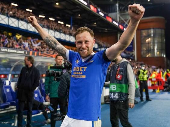 Mandatory Credit: Photo by Stuart Wallace Shutterstock (12925383bi) Scott Arfield of Rangers celebrates after the final whistle as Rangers progress to the UEFA Europa League Final after beating RB Leipzig 3-1 (agg. 3-2). Rangers v RB Leipzig, UEFA Europa League, Semi Final, Second Leg, Football, Ibrox Stadium, Glasgow, UK - 05 May 2022 EDITORIAL USE ONLY No use with unauthorised audio, video, data, fixture lists, club league logos or live services. Online in-match use limited to 120 images, no video emulation. No use in betting, games or single club league player publications. Rangers v RB Leipzig, UEFA Europa League, Semi Final, Second Leg, Football, Ibrox Stadium, Glasgow, UK - 05 May 2022 EDITORIAL USE ONLY No use with unauthorised audio, video, data, fixture lists, club league logos or live services. Online in-match use limited to 120 images, no video emulation. No use in betting, games or single club league player publications. Copyright: xStuartxWallace Shutterstockx 12925383bi