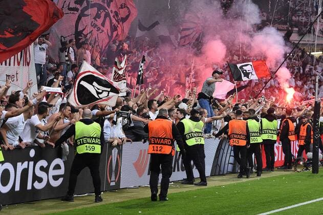 Soccer Europa League semifinal Eintracht Frankfurt West Ham United on 05 05 2022 at Deutsche Bank Park in Frankfurt Platzsturm Fanblock Fans Frankfurt run on the grass after the final whistle and rejoice over the victory and the entry into the Europa League final in Seville xHDx