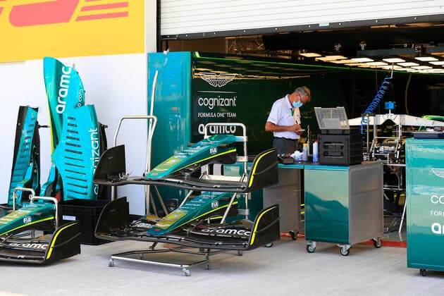 MIAMI GARDENS, FL - MAY 05: A crew member works on the car of Aston Martin Aramco Cognizant driver Lance Stroll (18) of Canada before the Crypto.com Miami Grand Prix on May 5, 2022 at the Miami International Autodrome in Miami Gardens, Florida. (Photo by David J. Griffin Icon Sportswire) AUTO: MAY 05 F1 Crypto.com Miami Grand Prix Icon9532205050161