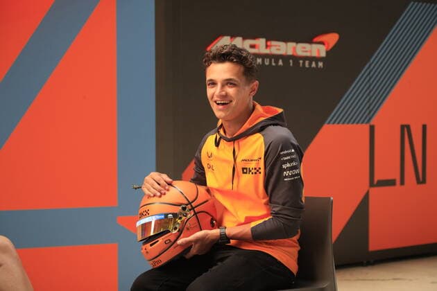 MIAMI GARDENS, FL - MAY 05: McLaren Renault driver Lando Norris (4) of Great Britain being interviewed in the paddock before the Crypto.com Miami Grand Prix on May 5, 2022 at the Miami International Autodrome in Miami Gardens, Florida. (Photo by David J. Griffin Icon Sportswire) AUTO: MAY 05 F1 Crypto.com Miami Grand Prix Icon9532205051401