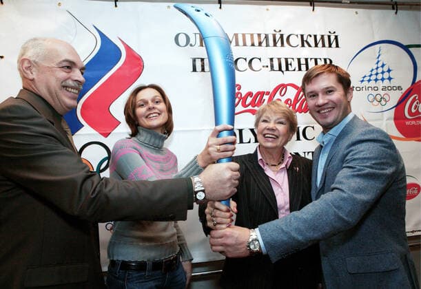 OLYMPIC FLAME ROSSOSHIK VASYUKOVA LATYNINA 121573 15.12.2005 From left to right participants in Olympic Baton, Turin 2006. Lev Rossoshik, Ilga Vasyukova, Larisa Latynina and Alexei Nemov. January 18, 2006 they carry the Olympic flame through Venice suburbs. Sergey Pyatakov Sputnik Moscow Russia  Copyright: xSergeyxPyatakovx